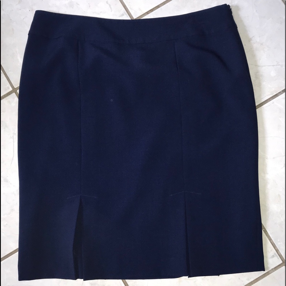 Navy blue pencil skirt with tulip hem.
